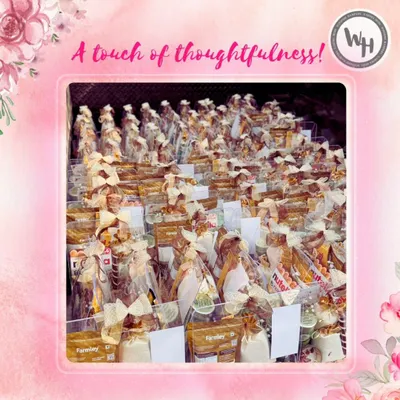 A touch of thoughtfulness in every hamper. This image shows a large bulk order, with each gift meticulously packed and ready for a corporate event or wedding.