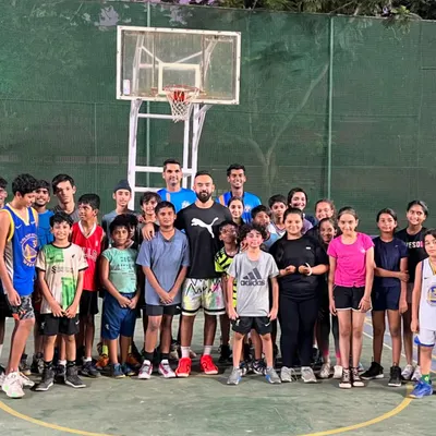 A group photo with India's 3v3 star, Dhruv Barman. It was a privilege to have him on the court to inspire our young champions.