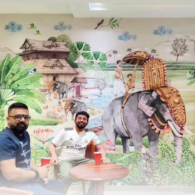 This custom mural depicting a traditional Indian scene provides a rich, cultural backdrop for a seating area. It’s a great example of how I can create a unique and immersive atmosphere for restaurants or themed cafes.