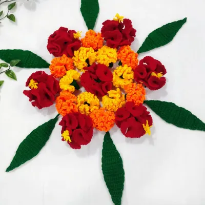Just a quick, beautiful arrangement of my handmade crochet flowers and leaves. These can be used to create a permanent, reusable floral rangoli or other decorations.