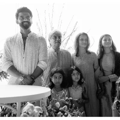 A beautiful family portrait of Zaheer with his loved ones. The natural light and relaxed poses create a warm and authentic image of family connection on this special day.