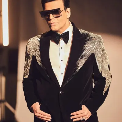 A closer look at the black velvet tuxedo I created for Karan Johar. The hand-strung silver beaded tassels on the shoulders are designed to catch the light and create a sense of movement and drama.