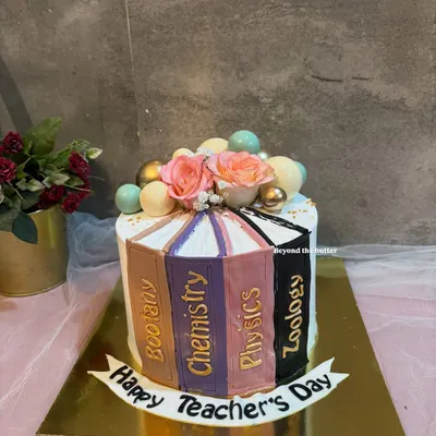 This was a dream theme for me. A cake designed as a stack of books for a teacher, with subjects like Botany, Chemistry, and Physics on the spines. I was so happy with how this turned out.
