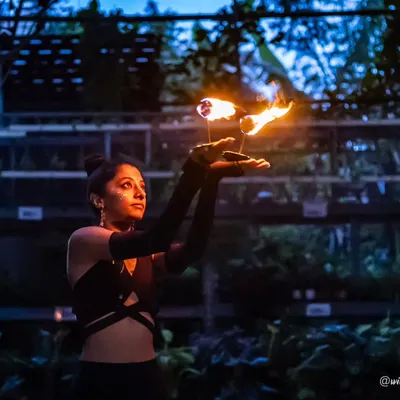 Holding fire lamps during a performance. There's a deep sense of focus and respect you have to have when working with fire. It’s a practice that has taught me so much about courage.