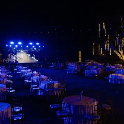 We transformed this large lawn into an epic Sangeet venue. With a fully equipped stage, dramatic blue lighting, and elegant guest seating, the space was ready for a night of spectacular performances and celebration.