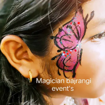 A close up of a beautiful butterfly face painting. I use high quality, skin friendly paints and add a touch of glitter to make the designs extra special.