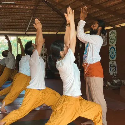 In Virabhadrasana I (Warrior I Pose), the goal is not just the shape but the feeling of strength and stability. I guide students to lift their hearts and ground through their feet, finding the balance between effort and ease. This is how we build a strong, intelligent practice.