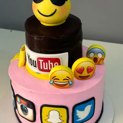 A fun, two-tier social media themed truffle cake for a digital marketing company's anniversary. This shows how I can tailor designs to match a company's brand and industry.