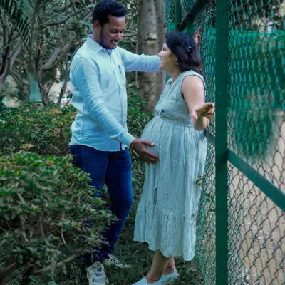 A candid and joyful moment between a couple in a park. My relaxed approach helps capture genuine interactions and laughter, making your photos feel authentic.