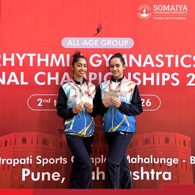 Our rhythmic gymnasts, Sneha Subodh Mahajan and Sharayu Nilesh Patil, proudly display their triple silver medals won at the Rhythmic Gymnastics National Championship.