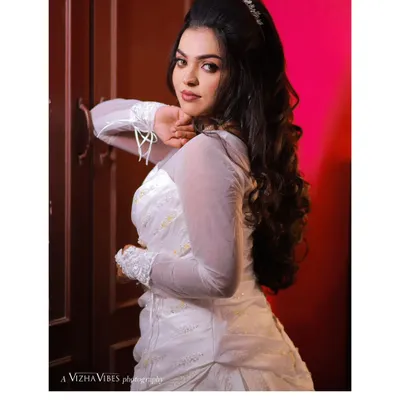 Embrace your elegance and let it shine. A beautiful look for a Christian wedding, featuring a white gown and soft, romantic makeup.