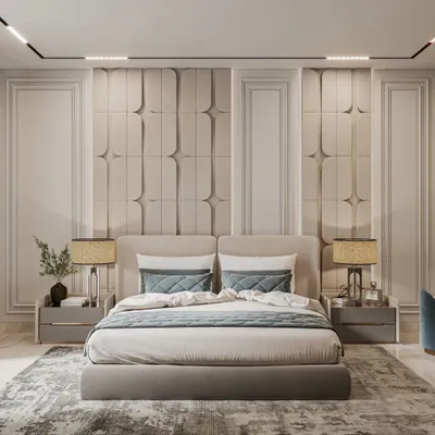 A masterclass in symmetry and texture, this bedroom features a stunning upholstered accent wall behind a custom bed. Matching bedside tables and lamps complete this hotel-like luxury suite, designed for ultimate comfort and style.