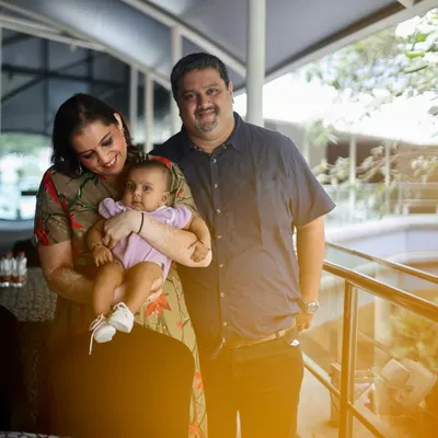 A candid moment of a new family. I love capturing these simple, happy portraits of parents with their baby.