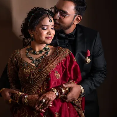 A beautiful moment between bride Lavanya and her groom. I provide makeovers for grooms as well, ensuring the couple looks perfectly coordinated.