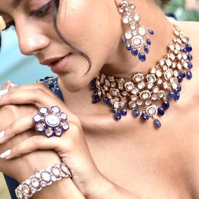 A close-up of a stunning polki and blue sapphire choker set I styled for Om Jewellers. The focus here is on the craftsmanship and the beautiful contrast of colors, perfect for a modern Indian bridal trousseau.