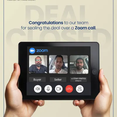 A deal being sealed over a Zoom call. This image perfectly captures our modern approach, where we facilitate seamless transactions for buyers and sellers, no matter where they are in the world.