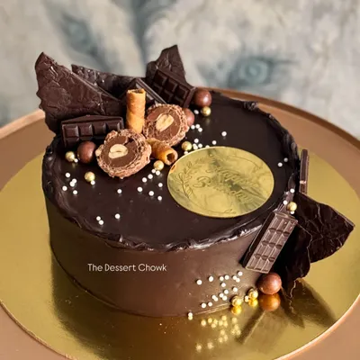 My signature Chocolate Truffle cake, loaded with chocolate shards, Ferrero Rocher, and chocolate wafer rolls. It's pure indulgence in every bite.