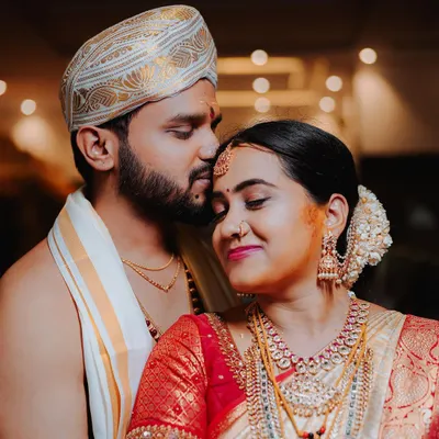 A close, intimate portrait of the couple, their eyes closed in a moment of quiet connection. This is the kind of raw emotion I love to capture.