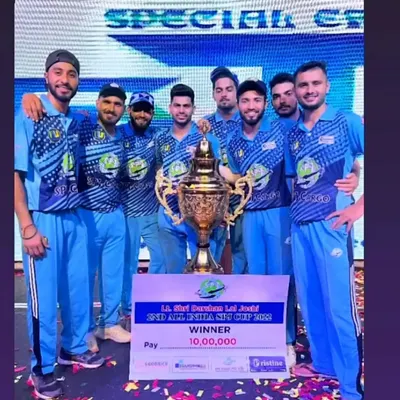 Celebrating a massive win at the 2nd All India SPJ Cup. Our players holding the trophy and a winner's cheque for 10,00,000 rupees after a nail-biting final.