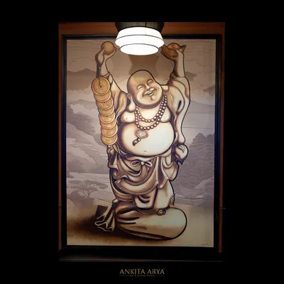 A custom Laughing Buddha wall art piece I designed for the restaurant Shanghigh. The artwork is created in an oriental style to match the restaurant's theme, adding a serene and joyful vibe to the ambiance.