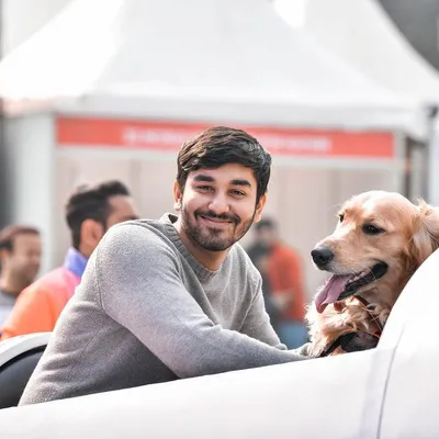 A smile from him and a happy pant from his best friend. This is the kind of relaxed, happy moment I love to capture. It’s a simple portrait of two friends enjoying a day out together.