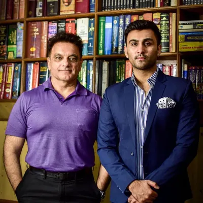 My son, Sameer, and I at our firm, Sanjay Kalra and Associates. We combine our strengths to offer comprehensive immigration law services, helping clients navigate the path to the US.