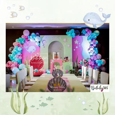 We created a magical underwater world for Avira's 2nd birthday. The setup featured a long dining table for the little guests, a colorful backdrop with whale and seahorse details, and vibrant balloon arches.