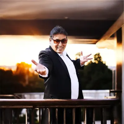 A professional portrait of me, ready to bring magic and entertainment to your event. I believe in presenting myself with the same level of quality and showmanship that I bring to my performances.
