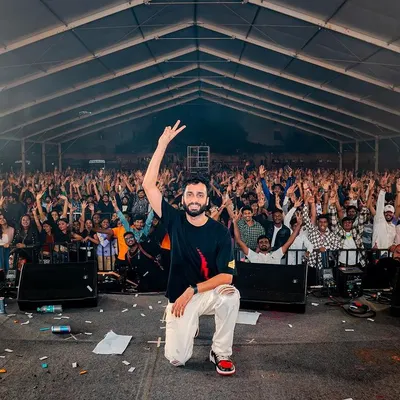 A moment of pure joy, kneeling before a crowd of 12,000 students at NHCE, Bangalore for Sargam '23. I had the honor of closing the stage for Dhvani Bhanushali.