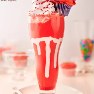 Our Red Velvet Cupcake Milkshake is a true showstopper. We blend creamy red velvet into a thick shake and top it with a mini cupcake, making it a visually stunning and delicious treat that's famous on Instagram.