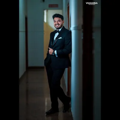A dapper portrait of the groom, looking sharp in his tuxedo. We make sure the groom gets his own moments in the spotlight.