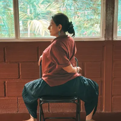 Here, Neelam demonstrates how a simple chair can be used for a deep spinal twist. This is part of our yoga therapy training, where we learn to make yoga accessible for everyone, regardless of flexibility or physical limitations.