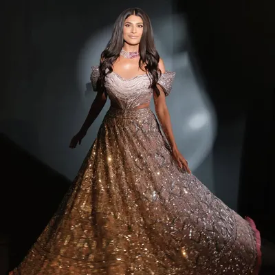 A full-length view of our work for Farhana Bodi. The glittering gown is perfectly complemented by our glamorous makeup and soft, flowing hair, creating an unforgettable, show-stopping presence.