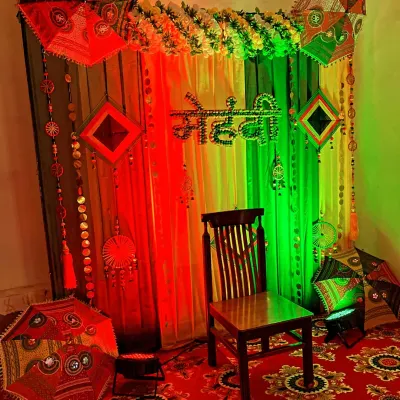 The Mehndi backdrop shown with dramatic red and green lighting, which can be changed to match the event's mood.