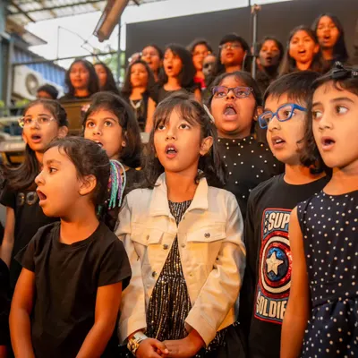 Our junior choir team singing their hearts out. These group sessions teach kids about harmony, rhythm, and the joy of making music together.