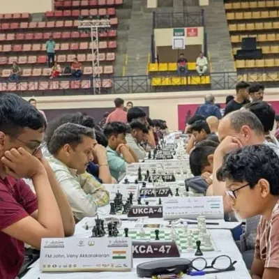 The intense atmosphere of a high-level competition. This photo from the Bengaluru Grandmaster Tournament shows players, including our own students, fully immersed in their games in a professionally organized hall.