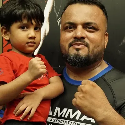 It starts from the youngest age. Here I am with one of our smallest warriors. At FCC, every child is part of the family from day one.