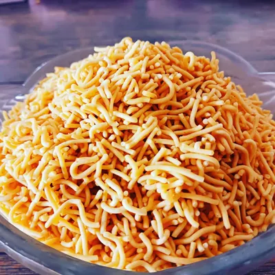 This is my roasted sev, a classic savoury noodle snack made healthy. It's crunchy and flavourful without being fried, making it a perfect guilt-free munchy.