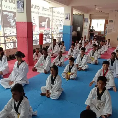 The class begins with meditation. This practice helps students clear their minds, improve focus, and prepare for the physical training ahead.