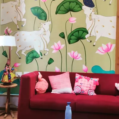 Seeing my art become part of a home is the best feeling. Here is a traditional Pichwai wall mural I painted for a residential project, bringing that 'Shivbharat' vibe to the living space. The cows and lotuses create such a peaceful atmosphere.