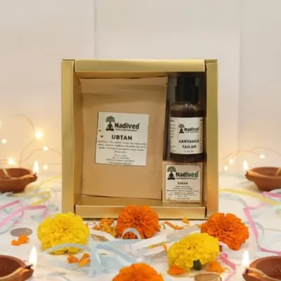 A closer look at the Abhyanga Snan Rituals gift box, surrounded by marigolds and diyas. This set is designed to bring the traditional practice of self-care into your home.