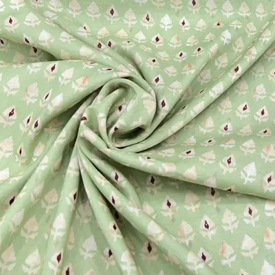 As soft as a cloud, as pretty as a print can be. This printed mul mul cotton in a lovely pastel green is made for sunlit days and comfortable, stylish kurtas or dresses.