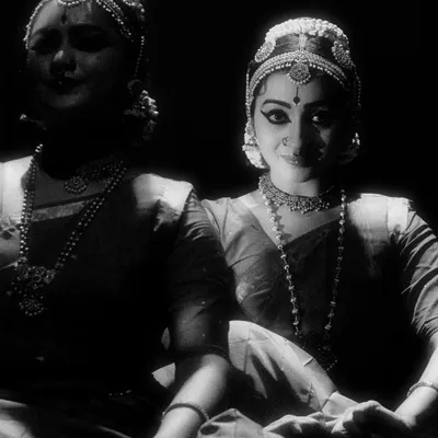 A black and white artistic shot from 'Nritya Lahari,' a group performance choreographed by my Guru. The lighting creates a dramatic, intimate mood.