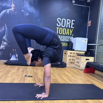The scorpion handstand requires immense shoulder stability, core strength, and spinal flexibility. It's a pose I've worked on for a long time, and it represents the peak of integrating strength and mobility.