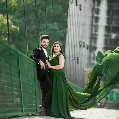 This dramatic green gown with a long, flowing train is one of my most popular rentals for pre-wedding photoshoots. I also provide coordinating suits for the groom-to-be.