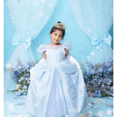 Toddlerhood is pure magic. This little one, dressed as a princess in a fairytale setting, is a perfect example of the dreamy, creative shoots we can design for your child.