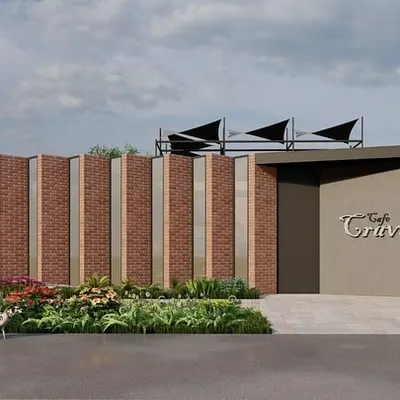 The street-front view of our 'Cafe Cravings' concept. The facade combines vertical brick panels with a sleek, modern entrance, creating an inviting and contemporary look that stands out in an urban setting.