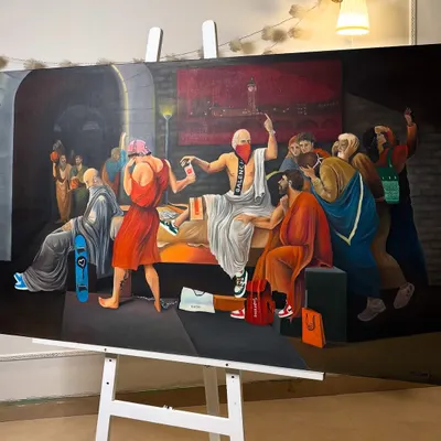 The 'Death of Socrates (hypebeast edition)' on the easel in my studio. This large-scale oil painting blends classical art with contemporary brands like Balenciaga and Supreme.