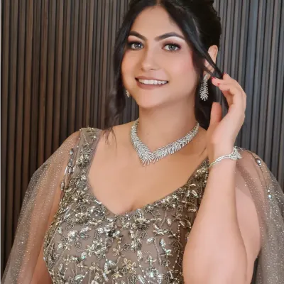 My 'Barbie Bride' Apoorva, looking absolutely stunning for her engagement. We went for a nude makeup look with a beautiful diamond necklace and an elegant grey gown.
