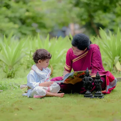 Including family in the shoot creates such warm memories. Here, a mother and son share a quiet moment reading together, surrounded by traditional Vithoba-Rukmini idols. These are the gentle, heartfelt stories I aim to tell.